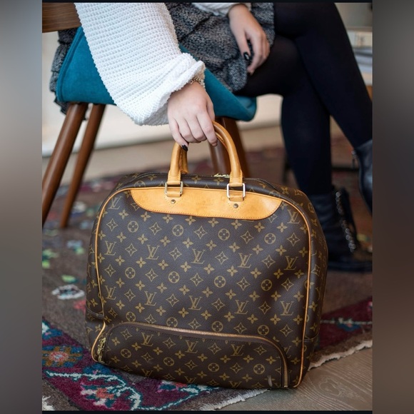 Authentic Louis Vuitton evasion MM monogram weekend unisex travel bag